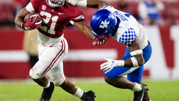 Nov 21, 2020; Tuscaloosa, Alabama, USA; Alabama Crimson Tide running back Jase McClellan (21) runs against Kentucky Wildcats defensive back Kelvin Joseph (1) at Bryant-Denny Stadium. Mandatory Credit: Mickey Welsh/The Montgomery Advertiser via USA TODAY Sports  